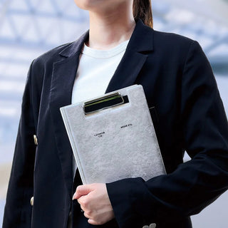 A5 field pad refill planner sheets on clipboard, showing calendar and notes layout