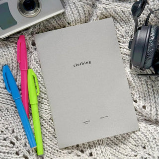 Clothing-style B6 notebook with light gray cover and centered “clothing” title