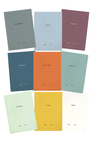 LACONIC style notebook covers in mixed colors, each with a title label at top