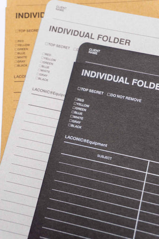 Close-up of A5 individual folders showing “INDIVIDUAL FOLDER” title in black and tan
