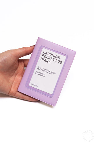 Hand holding Purple Pocket Log Diary with LACONIC Pocket Log Diary text