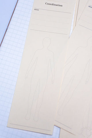 Close-up Coordination bookmarker with standing figure outline and memo line sections