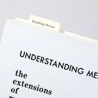 Reading Memo bookmarker tab on white book page with “Reading Memo” header