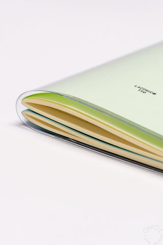 Green LACONIC style notebook, side view showing layered page edges