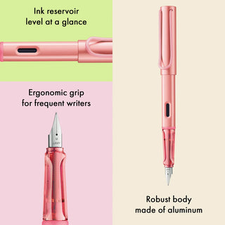 Flamingo pink fountain pen with ergonomic grip, side cutout, and visible fine nib
