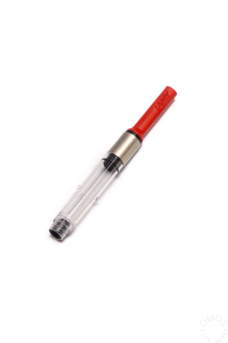 Fountain pen ink converter with clear body and red cap