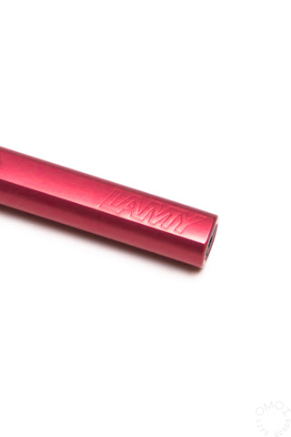 Fiery red fountain pen barrel with engraved AL-Star branding
