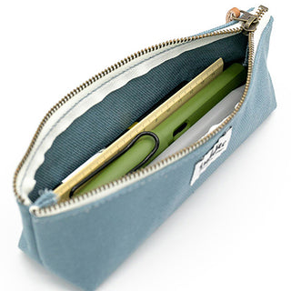 Blue LUDDITE boat pen case opened, showing pens and zipper lining.