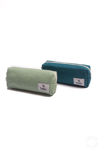 Pair of box pen cases: sage and teal with zipper and rectangular brand patches