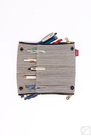 Black-and-cream striped pen case pouch with pen inserts and gold zipper, fabric eyelets