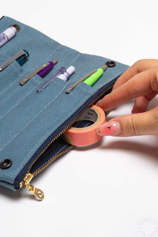 Blue grey zip pencil case detail with pens and washi tape pouch compartment
