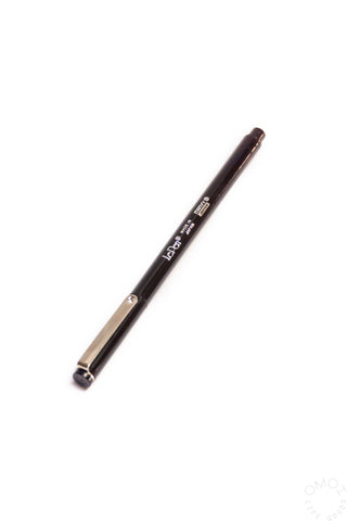 Le Pen ballpoint pen with dark brown barrel and gold clip
