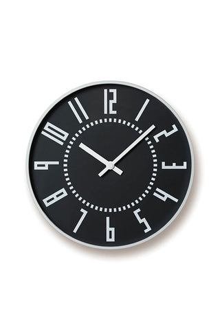 Black wall clock with silver frame, white numerals and hands on dark face