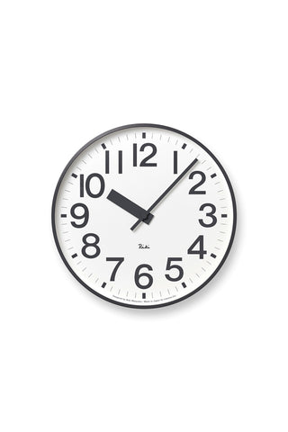 Round aluminum public wall clock, white face with black numbers and hands.
