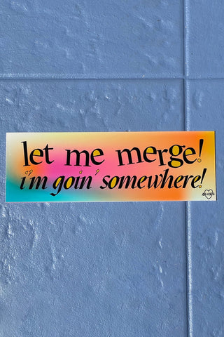 Colorful bumper sticker reading 'Let me merge!' and 'I'm goin' somewhere!'