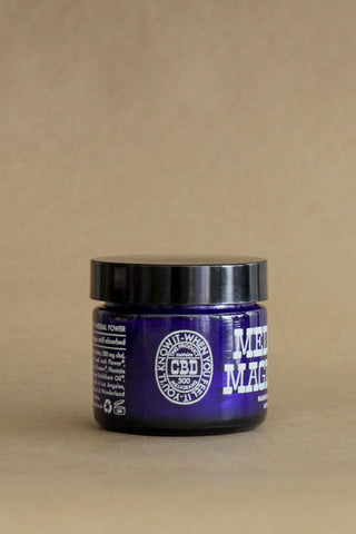 CBD medicinal magic balm jar with black lid, purple glass, CBD seal label