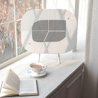 Löv air purifier on cradle stand, cream white, with striped front panel