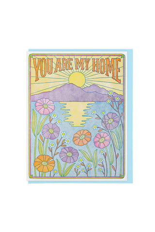 Greeting card: 'You Are My Home' on colorful sunrise and flower landscape