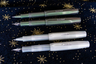 Light green fountain pen with medium nib, capped barrel and clip