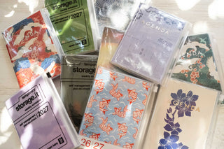 Assorted A6 weekly planner covers featuring 2027 and vertical date sections