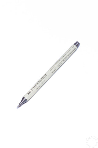 White gel ink metal pen angled view with silver tip and clip