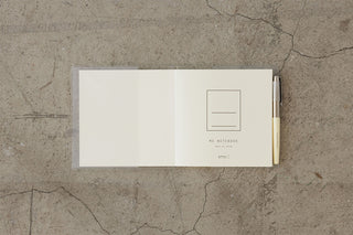 A5 square notebook cover, open to cream pages with inner pocket and label