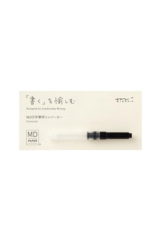 MD fountain pen converter in packaging, clear chamber with black end