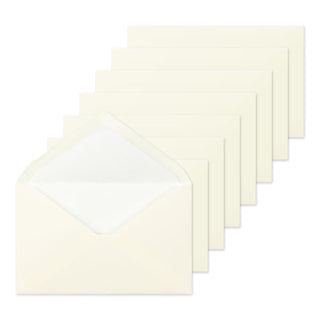 Stack of cream envelopes with matching diamond flaps