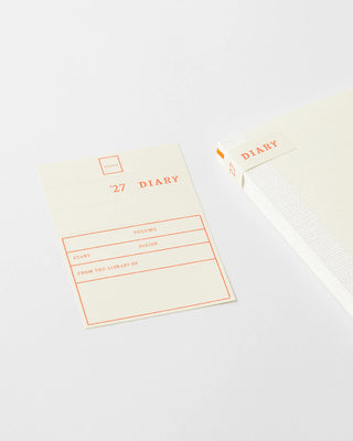 MD notebook diary slip and cover band with orange title text