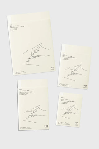 MD notebook monthly planner covers, cream pages with line-art and MD logo on corners