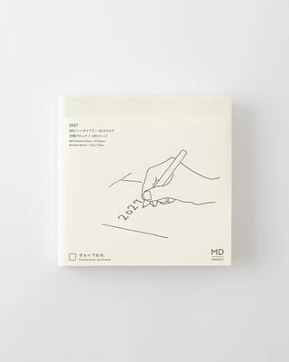 White page-a-day planner notebook with MD logo and 2027 line-art drawing