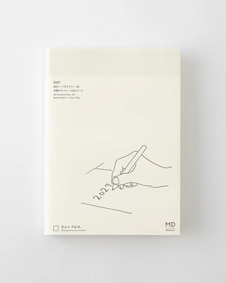 Cream page-a-day planner with 2027 cover details, pen illustration, and MD logo