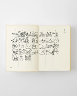 Open page-a-day planner with illustrated day pages and date panel
