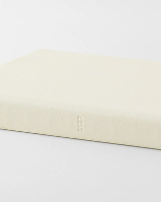 Cream planner cover with embossed 2027 on the spine