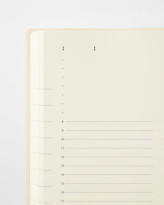 Page-a-day planner notebook page with numbered header dots and horizontal lines