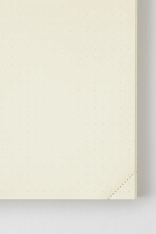 Inside spread of cream A5 page-a-day journal with dotted writing pages