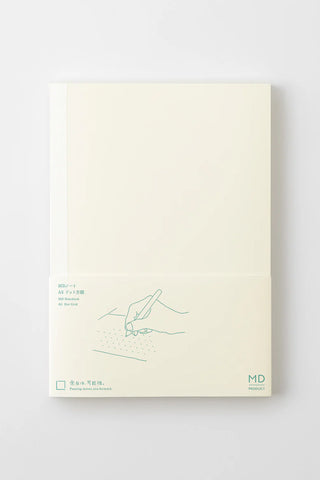 Cream notebook front with line drawing and small MD branding