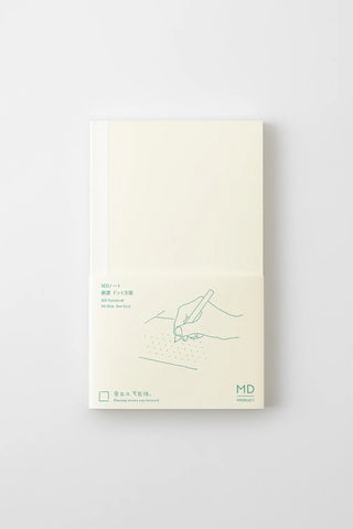Cream dot grid notebook front cover with line drawing and MD branding