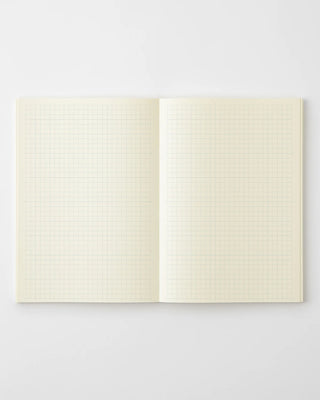 Open MD grid notebook, cream pages with fine grid lines