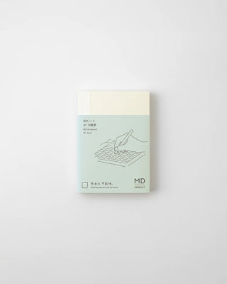 MD grid notebook cover, teal bottom panel with hand and calculator line illustration