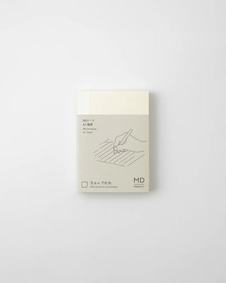 MD lined notebook closed with cream cover and minimal line-art illustration.