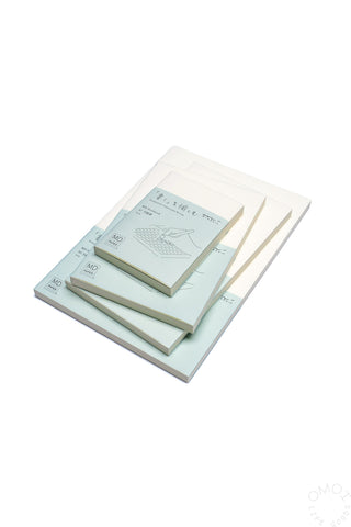 MD grid notebook set of 3, layered cream covers with teal line illustration
