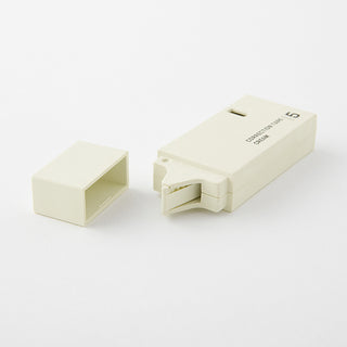Correction tape dispenser, 5mm cream case with open inner holder
