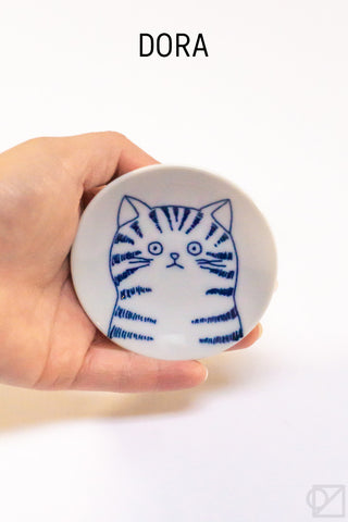Ceramic cat face dish with blue-and-white tabby cat illustration