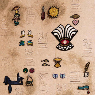 Embroidered patch set featuring assorted motifs and a large Nefertiti lips patch