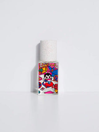 Eau de parfum bottle with colorful cartoon label, side view