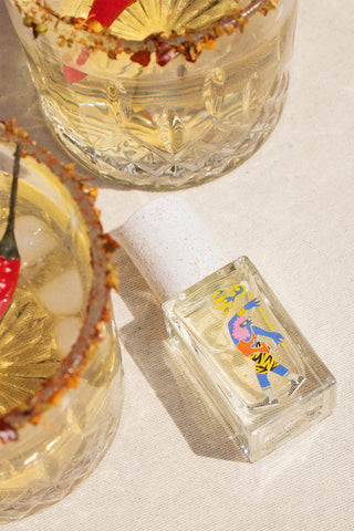Eau de Parfum 15ml bottle with illustrated label, clear glass and white cap