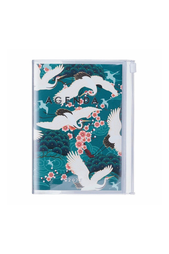 A6 weekly vertical planner with green bird-themed cover and floral accents