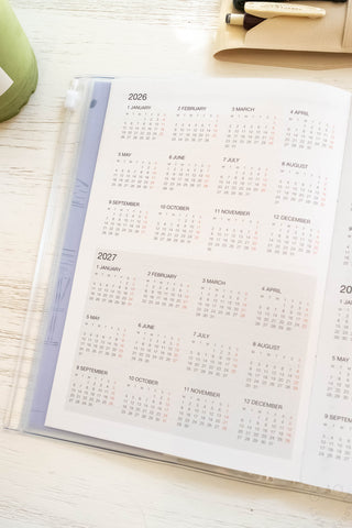 Open yearly calendar pages with month grids for 2026–2029, 2027 shown