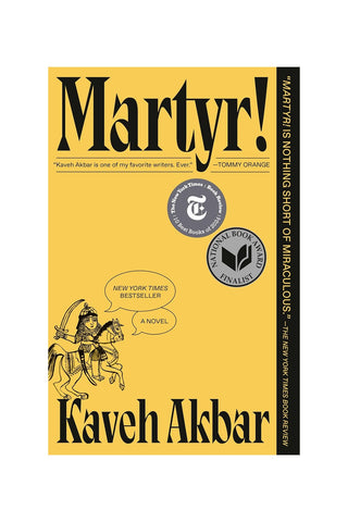 Martyr! novel paperback book cover with yellow and black typography